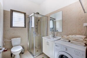 Shower, hair dryer, towels