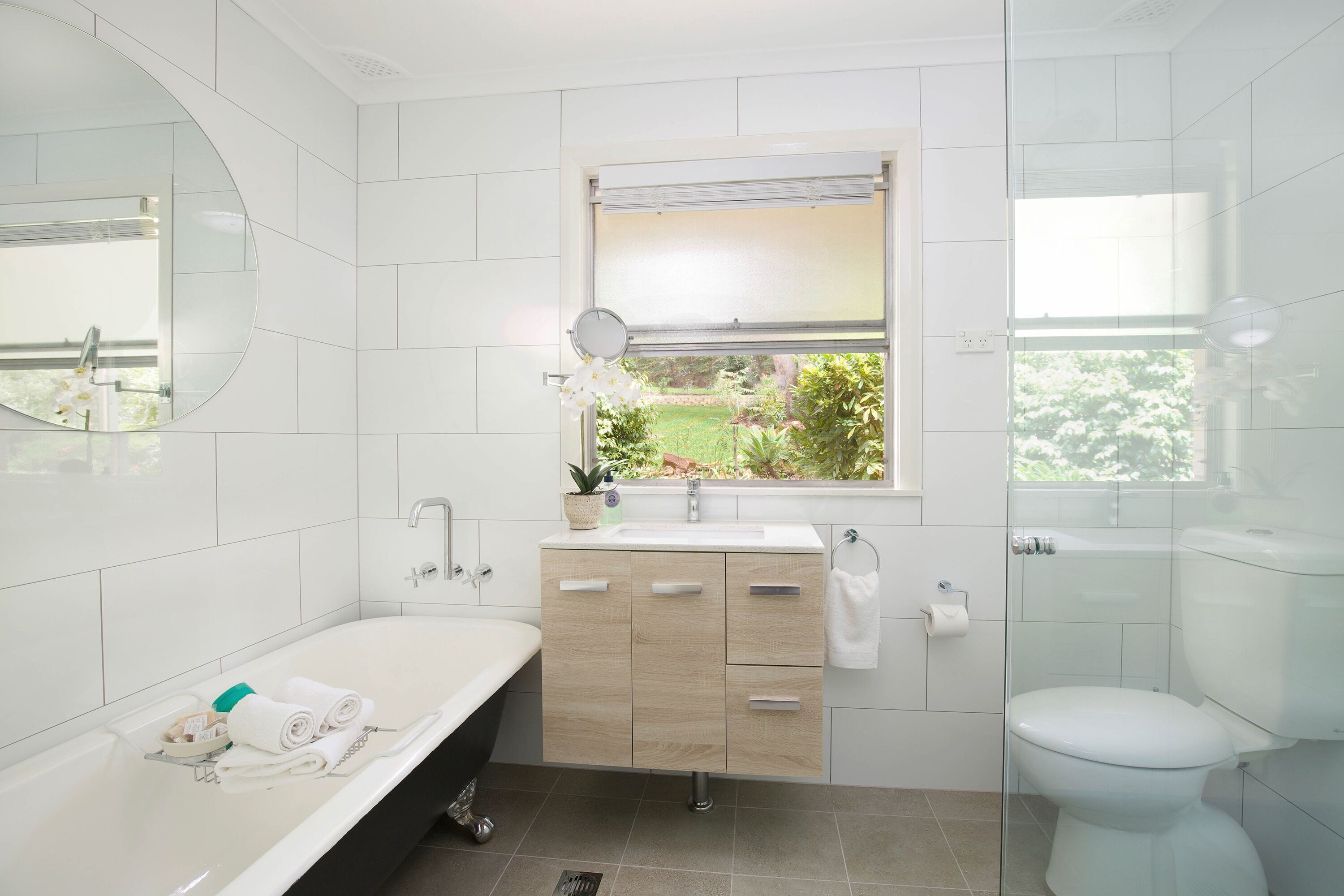 Bathtub, hair dryer, towels, soap