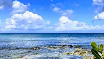 On the beach, sun-loungers, beach towels
