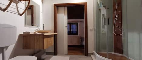 Combined shower/bathtub, jetted bath, hair dryer, bidet