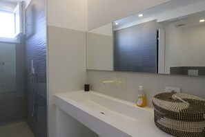 Hair dryer, towels, soap, shampoo