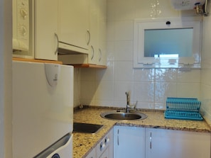 Fridge, microwave, coffee/tea maker, toaster