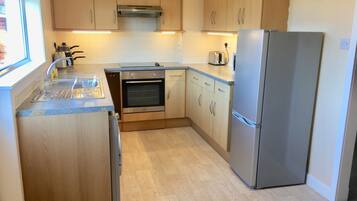 Cottage, 2 Bedrooms | Private kitchen | Microwave, toaster