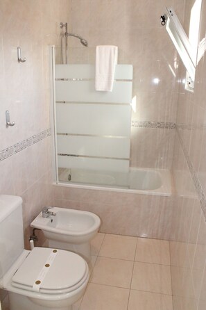 Combined shower/bathtub, hair dryer