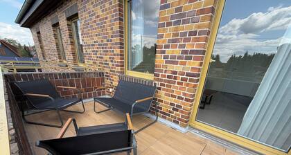 Ferienwohnung mit Balkon in großzügigem Haus mit Hof und Garten