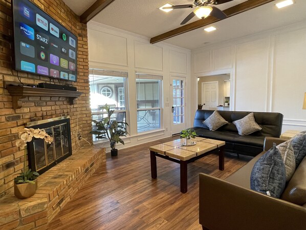 Smart TV, fireplace, books