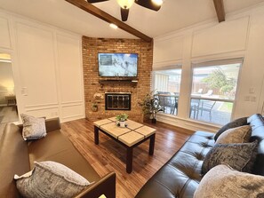 Smart TV, fireplace, books