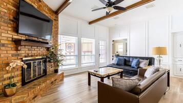 Smart TV, fireplace, books