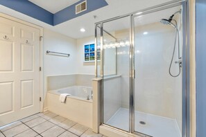 Combined shower/bathtub, towels - Beautiful Oceanfront Condo, Recliner, Lazy River | Windy Hill Dunes - 1402 (North Myrtle Beach)