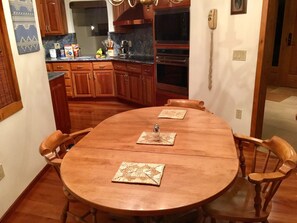 Eating area off kitchen seats six