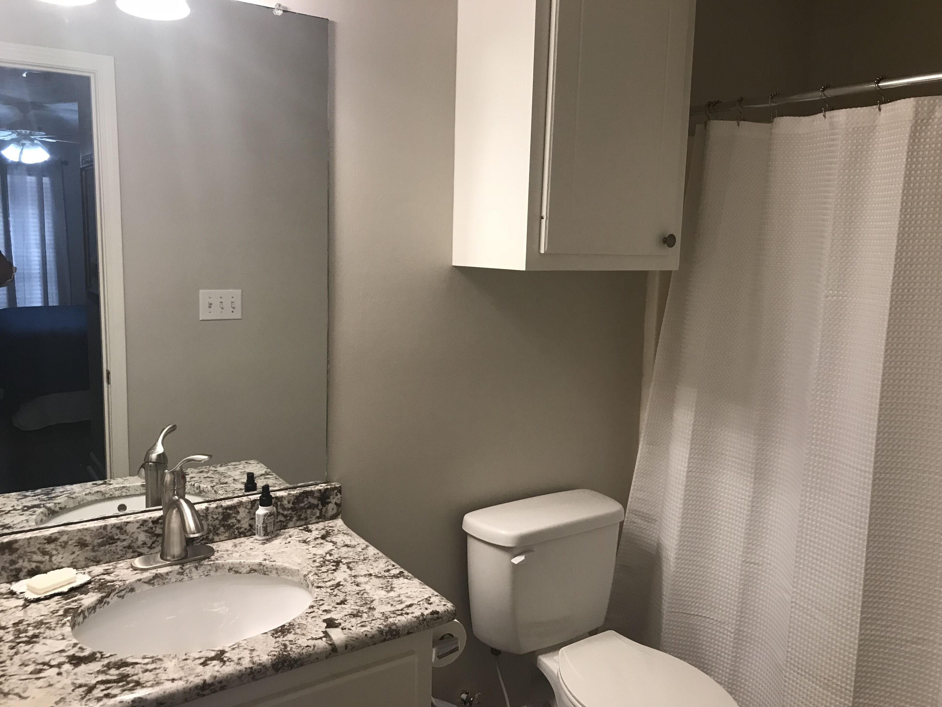 Combined shower/tub, hair dryer, towels, soap