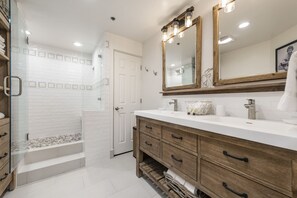 Bathtub, hair dryer, towels, soap