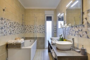 Bathtub, hair dryer, towels