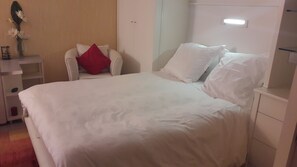 1 chambre, fer et planche à repasser, Wi-Fi, literie fournie