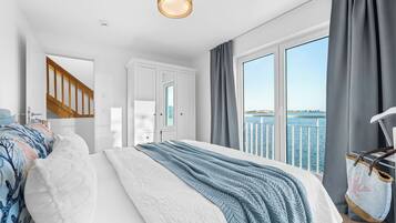 2 chambres, coffres-forts dans les chambres, fer et planche Ă repasser