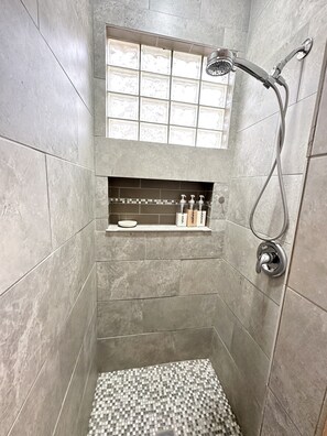 Shower, hair dryer, towels, soap
