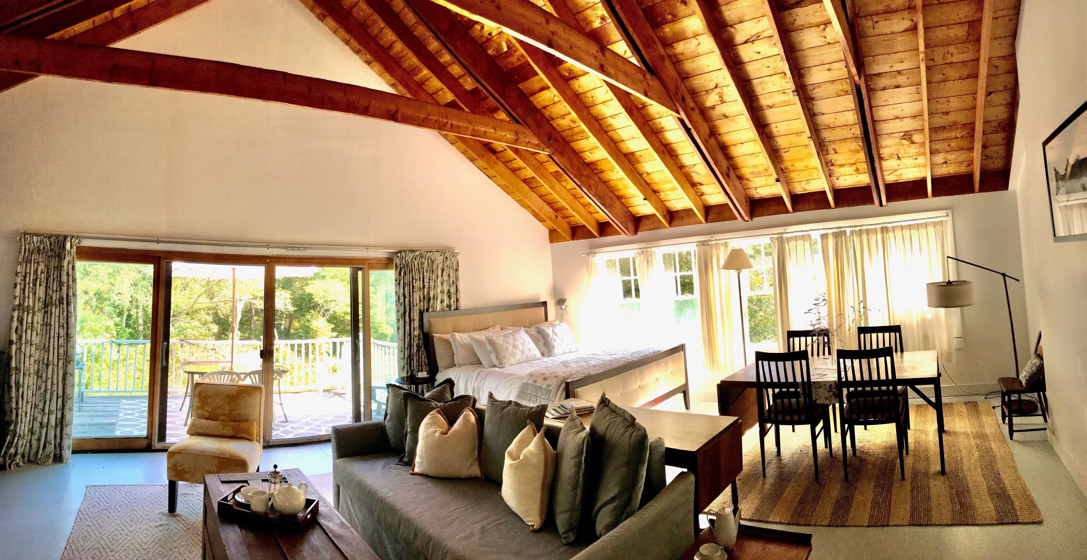Barn studio with king sized bed, living/dining, full bath, kitchenette, balcony