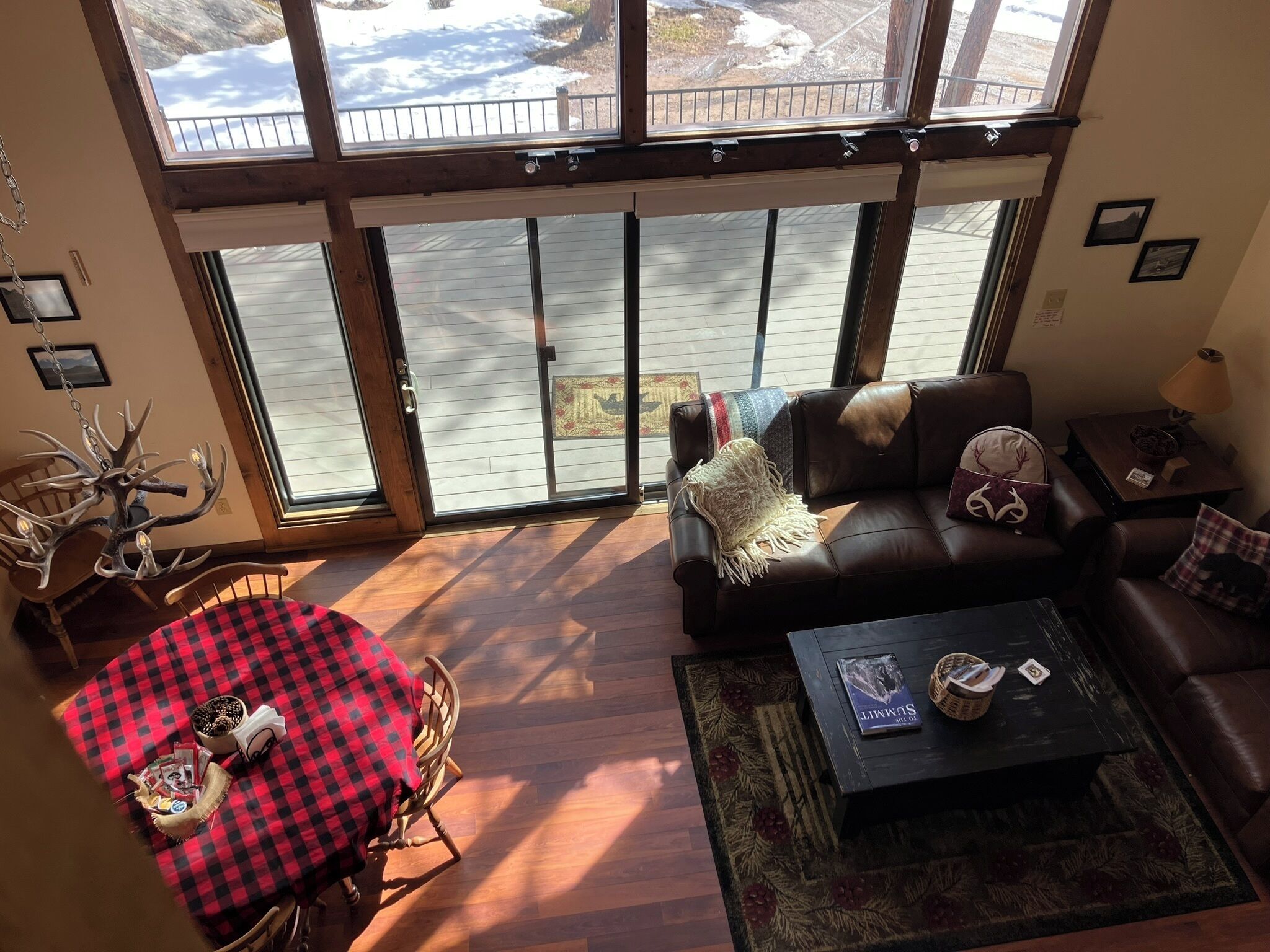 Flat-screen TV, DVD player, books, video library