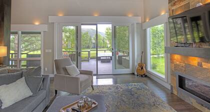 Modern home on creek and golf course with mountain views; ideal 2 families