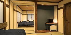 Habitación triple Deluxe | Wifi gratis y ropa de cama 