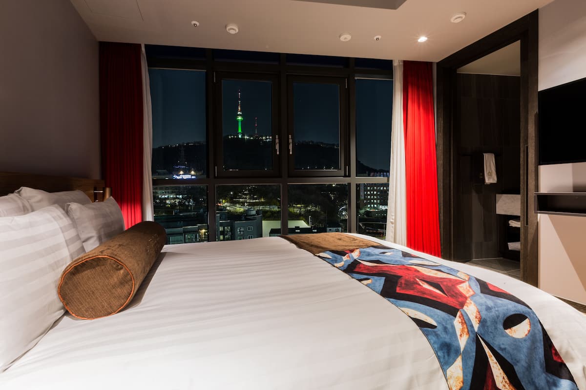 In-room safe, individually decorated, desk, blackout curtains