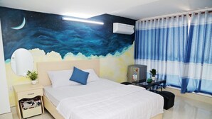 A bedroom with a bed, night sky mural, air conditioning unit, curtains, and a small table with a plant. - Homestay 78 (Ho Chi Minh City)