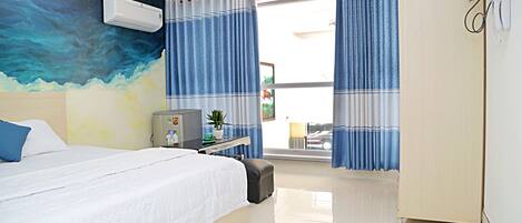 Standard Room, 1 Queen Bed | Desk, blackout drapes, iron/ironing board, free WiFi