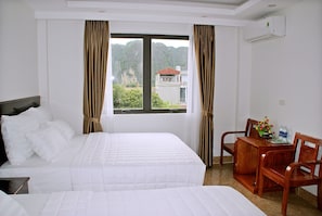Desk, blackout curtains, free WiFi, bed sheets