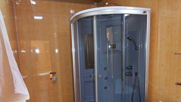 Luxury Suite, Non Smoking | Bathroom | Shower, hydromassage showerhead, free toiletries