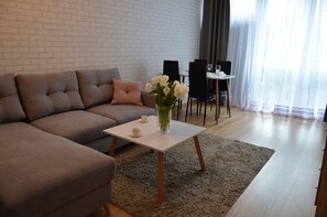 Comfort Apartment, Park View | Living area | Flat-screen TV - Panda Apartments Grzybowska-Centrum (Warsaw)