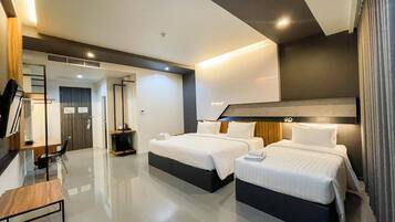 Junior Family Room | Caja fuerte, cortinas opacas, wifi gratis y ropa de cama
