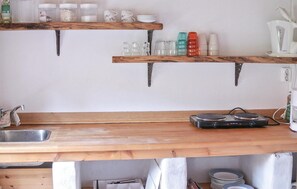Fridge, microwave, stovetop, coffee/tea maker