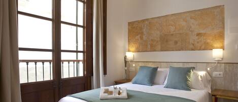 Down duvets, memory-foam beds, in-room safe, laptop workspace