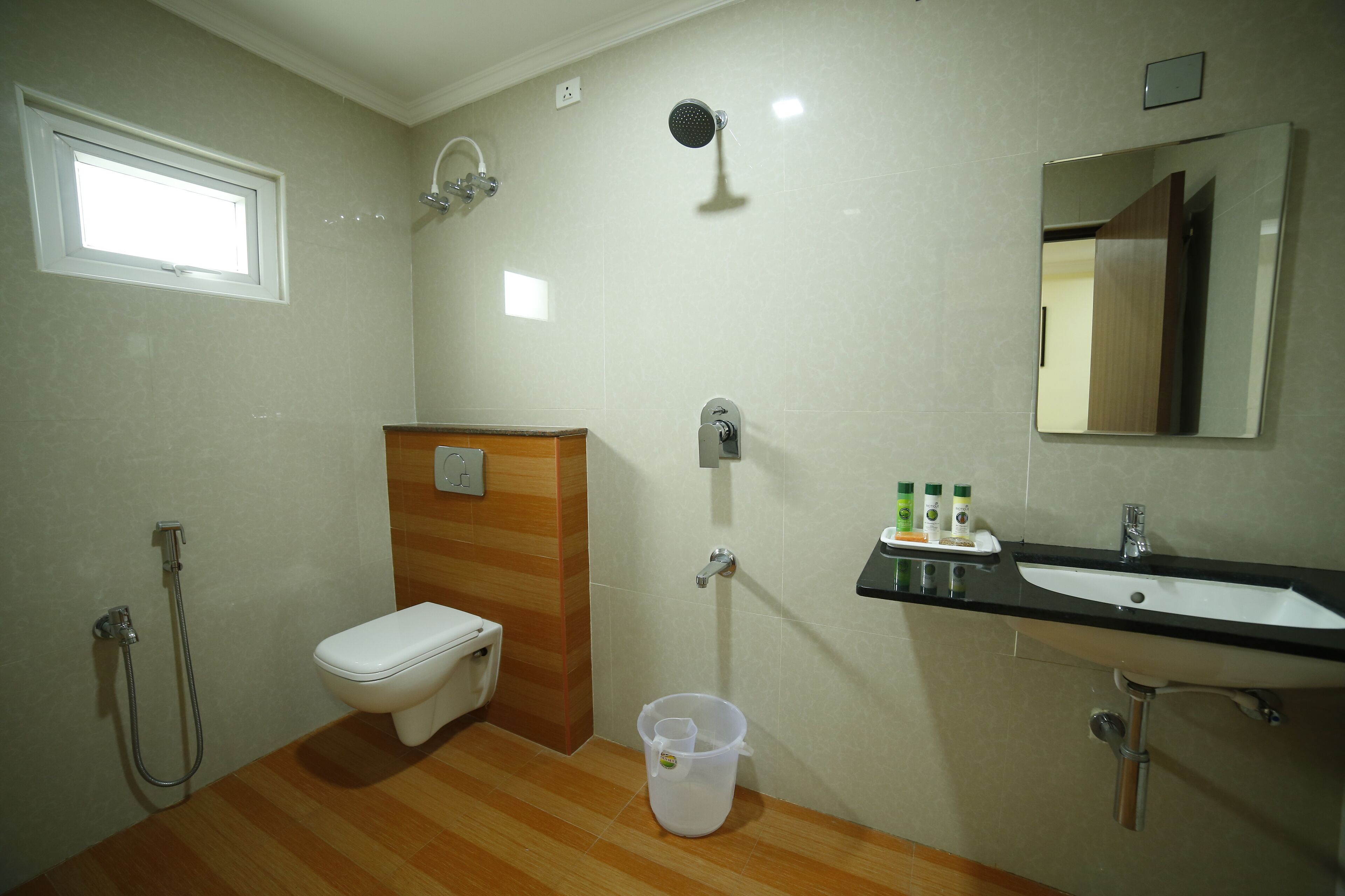 shower, free toiletries, slippers, towels