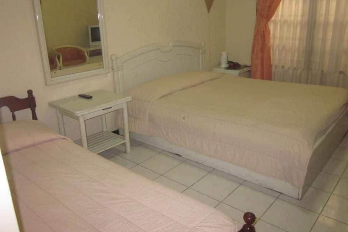 Standard Triple Room | Desk, rollaway beds, free WiFi