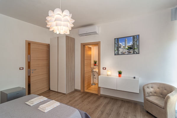 Værelse til 3 personer | Mørklægningsgardiner, gratis Wi-Fi, sengetøj