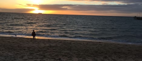 On the beach, white sand