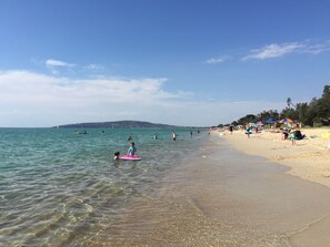 On the beach, white sand
