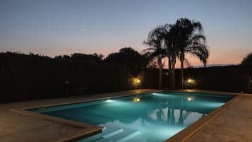 Seasonal outdoor pool, pool umbrellas, pool loungers