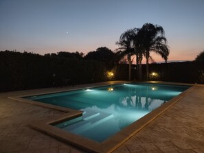 Seasonal outdoor pool, pool umbrellas, sun loungers