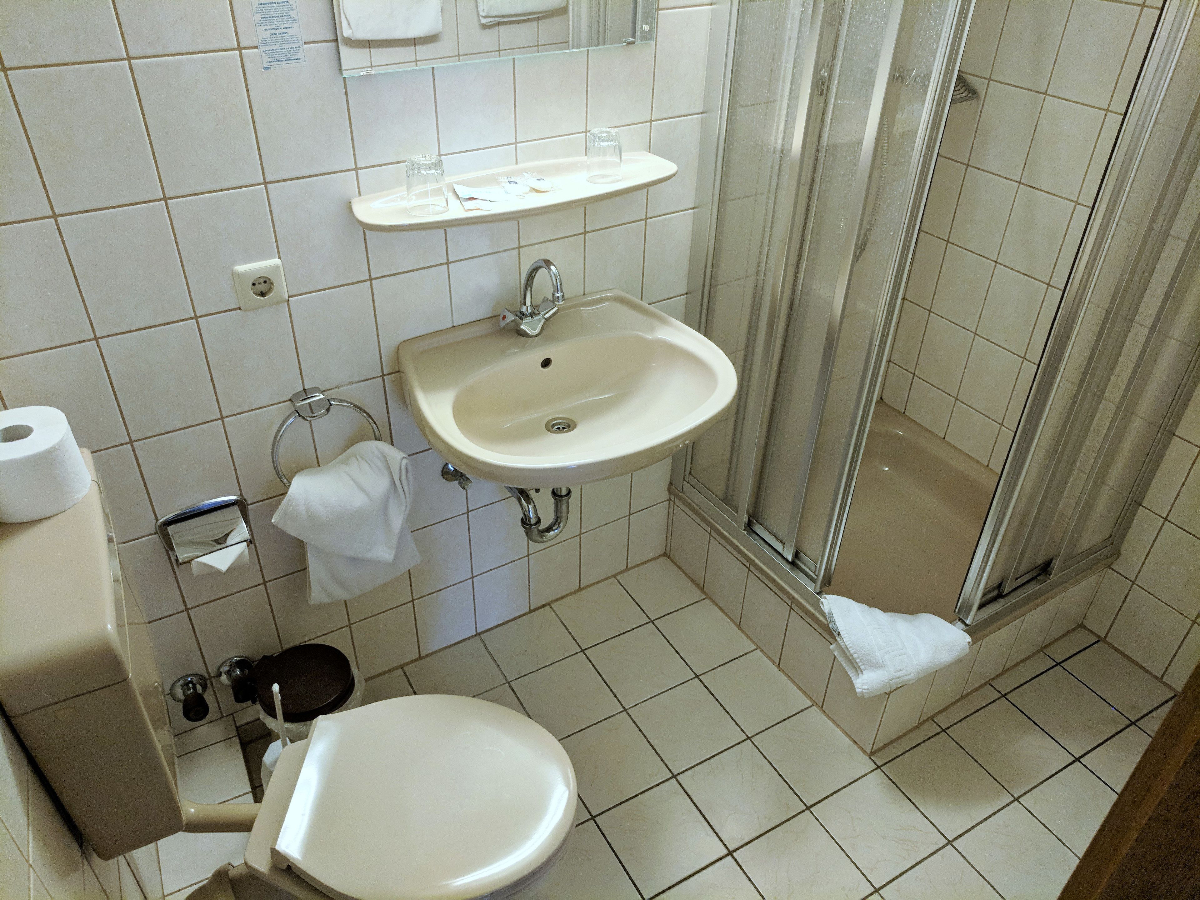 economy single room | bathroom | shower, free toiletries, hair dryer, towels