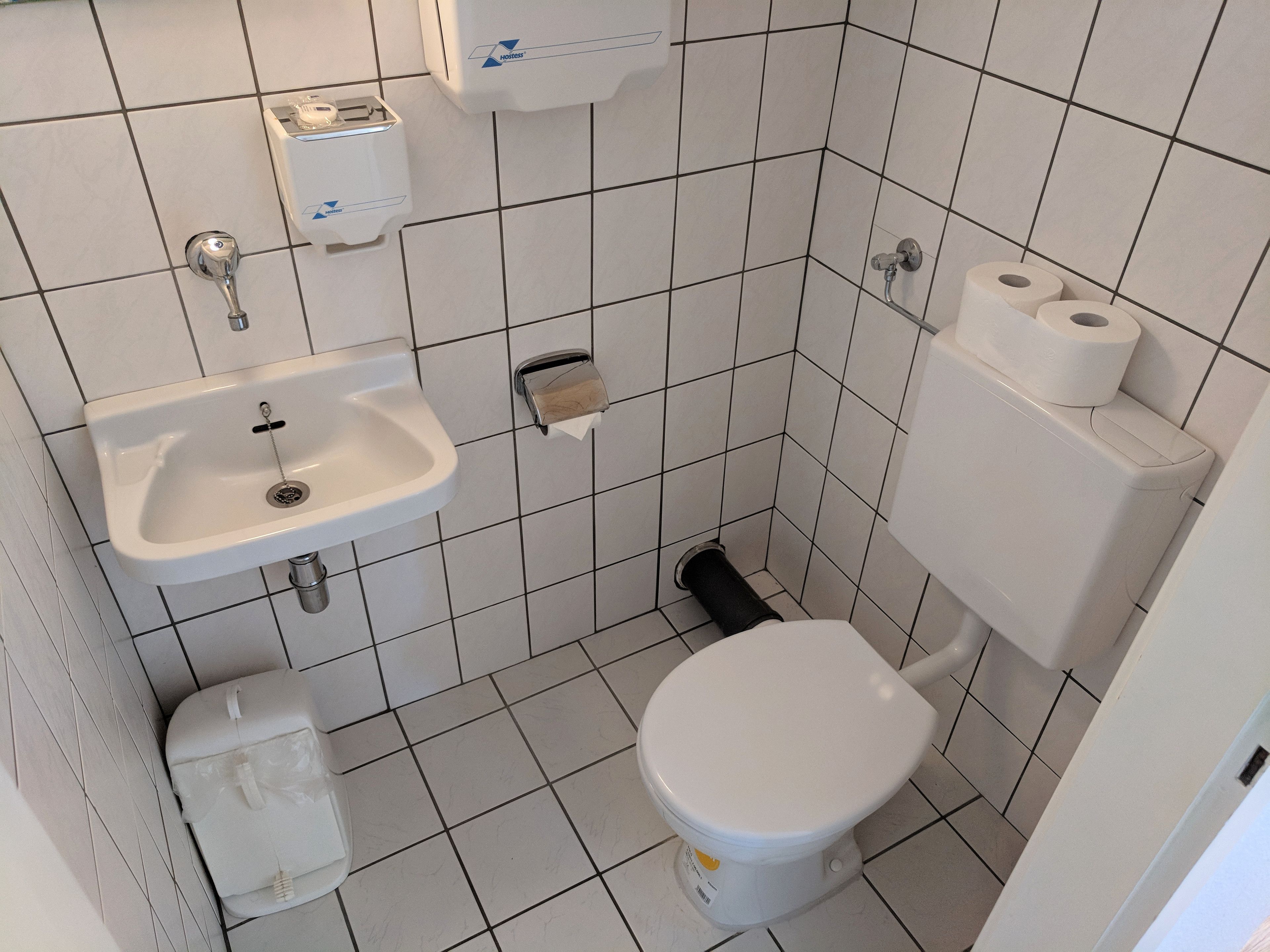 economy single room | bathroom | shower, free toiletries, hair dryer, towels
