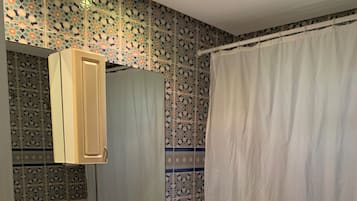 Deep soaking tub, rainfall showerhead, free toiletries, hair dryer