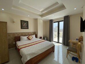 Executive Room, Beach View | Minibar, desk, soundproofing, free WiFi