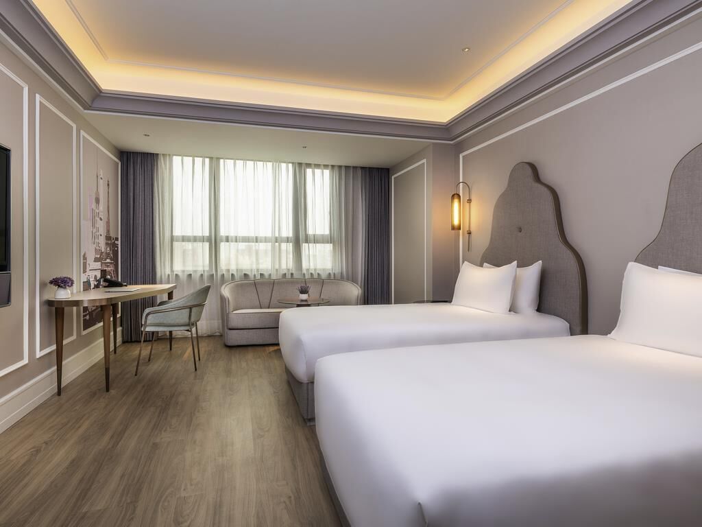 Camera Deluxe, 2 letti singoli | Una cassaforte in camera, tende oscuranti, insonorizzazione