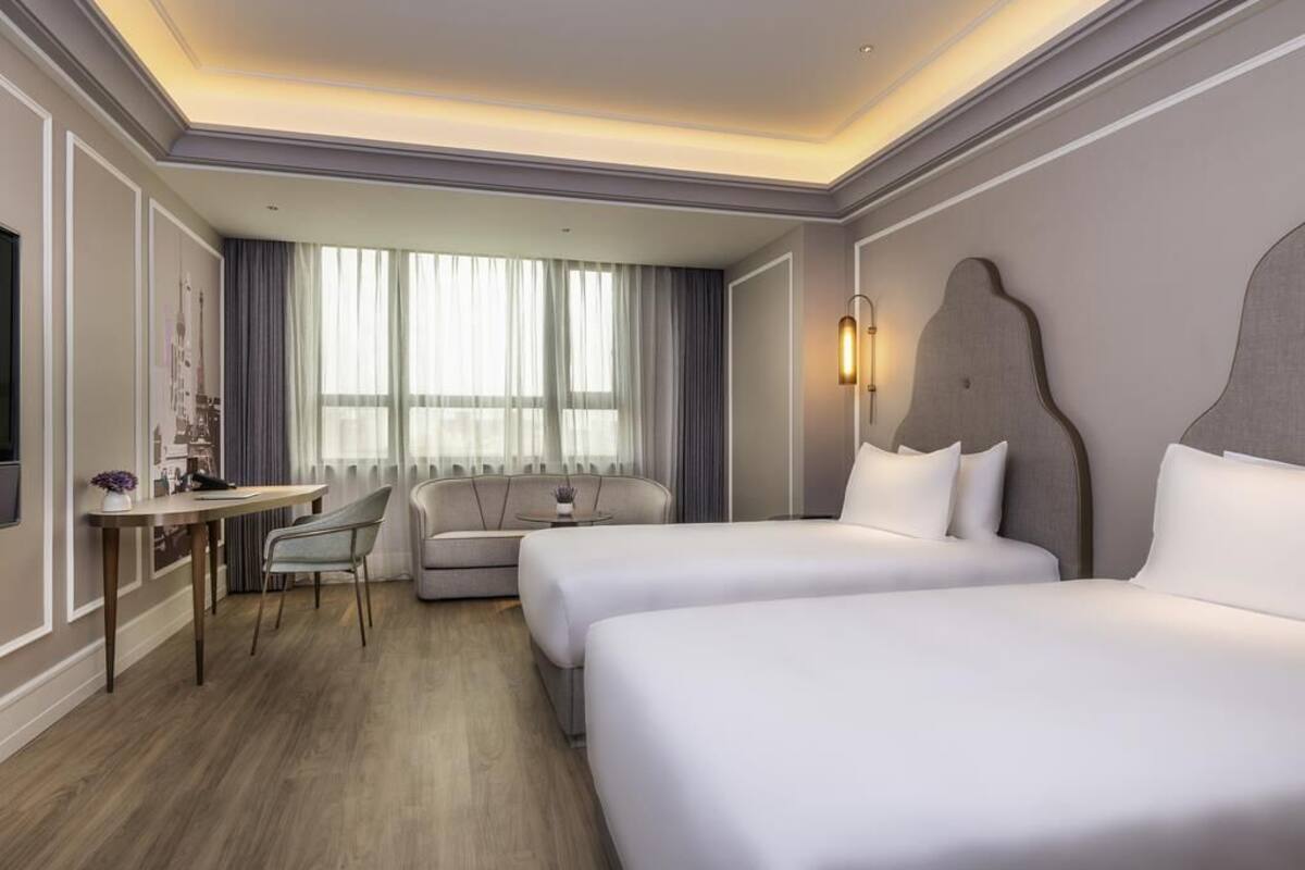 Camera Deluxe, 2 letti singoli | Una cassaforte in camera, tende oscuranti, insonorizzazione