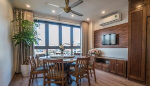 Panoramic Penthouse | Private kitchen | Fridge, microwave, stovetop, electric kettle - iRest Apartment (Hanoi)