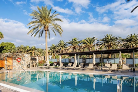 2 outdoor pools, pool umbrellas, sun loungers