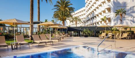 2 outdoor pools, pool umbrellas, pool loungers