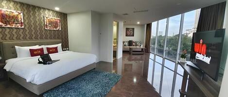 Coffres-forts dans les chambres, fer et planche à repasser